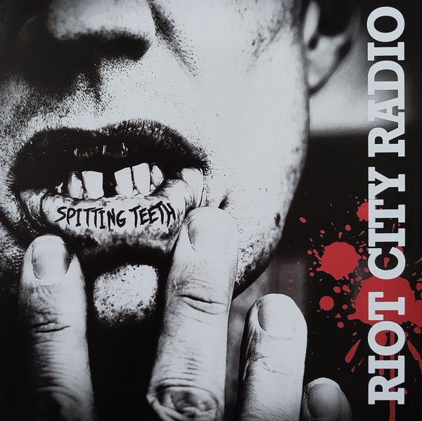 riot city radio-spitting